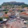The neighborhood of Slaka featuring buildings against the Acropolis of Athens